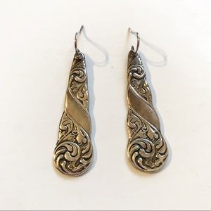 Silver flatware earrings.